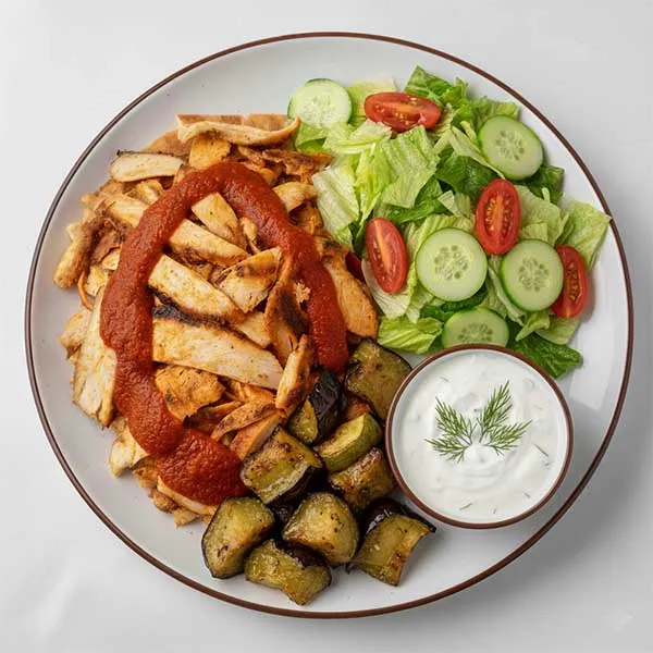 Iskender Style Chicken Doner with Mediterranean mixed salad and Haidari